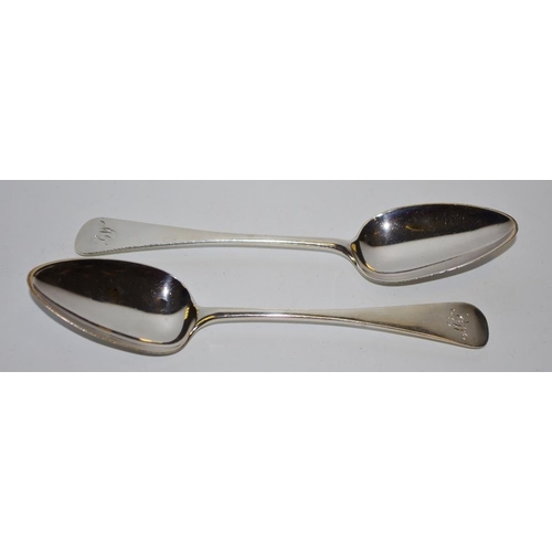 312 - A pair of Scottish George III serving spoons dated 1812 by Robert Gray & Son monogrammed GW to handl... 