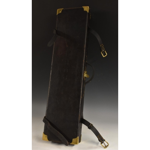 3560 - Shooting - a Victorian brass mounted leather rectangular gun case, hinged cover enclosing an arrange... 