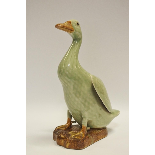 35 - A Chinese celadon glazed goose 26cm high