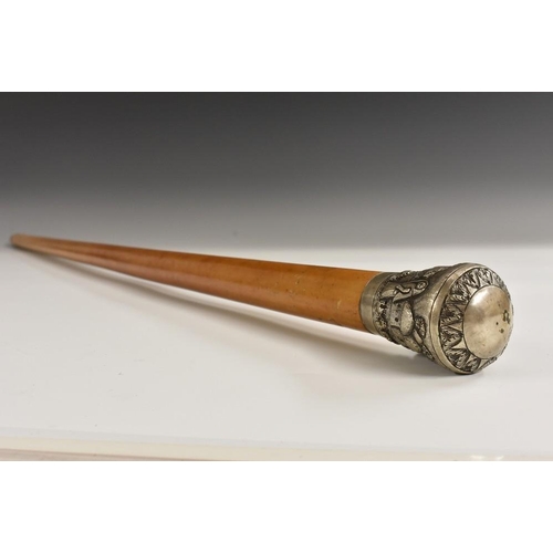 3593 - A 19th century Indian silver mounted malacca walking cane, the domed pommel chased with figures in a... 