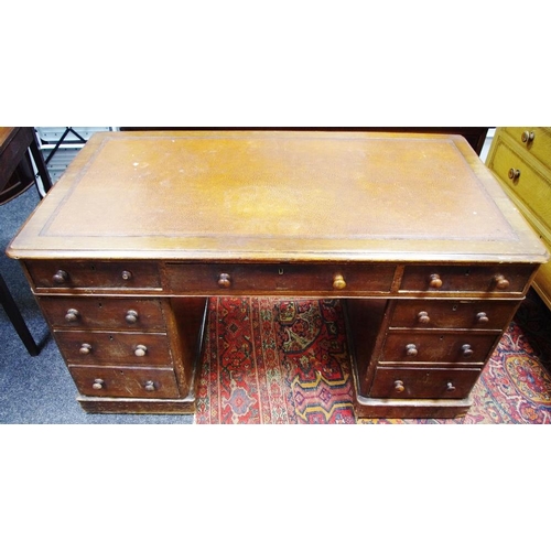 400A - A Victorian mahogany kneehole desk, tooled leather inlaid top c.1860