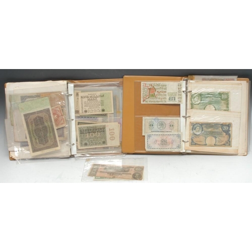 3696 - Banknotes, World: a collection of banknotes contained in two Boots ring bound albums, 1 Miscellaneou... 