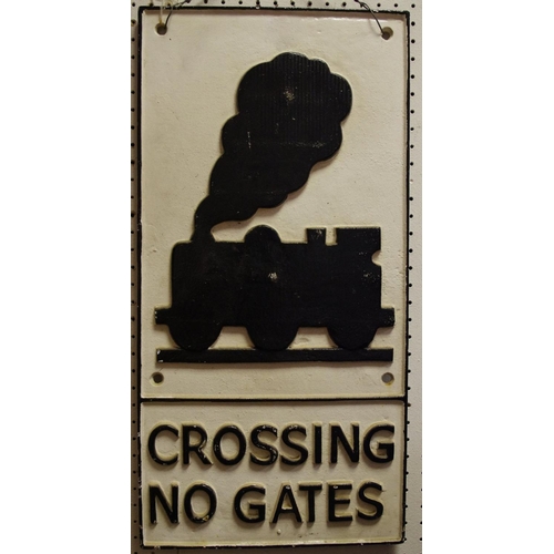 424 - A cast metal reproduction railway sign, 'Crossing No Gates'