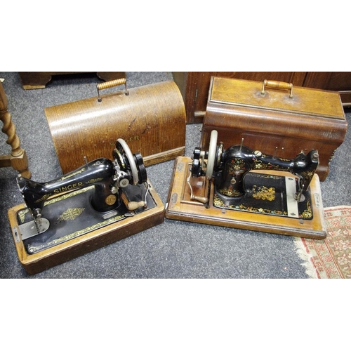 434 - A CWS hand powered sewing machine cased; another singer (2)