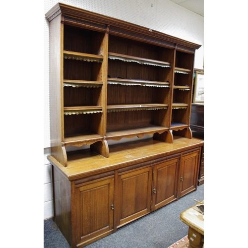 436 - A substantial early 20th century oak dresser / bookcase