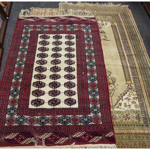 441 - A Persian style rug, the central field with vases of flowers in shades of yellow and brown, approx 9... 