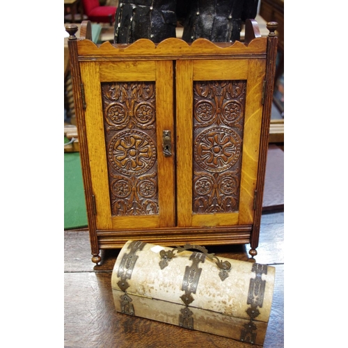 455 - A Victorian mahogany smokers cabinet, carved panel doors holding two polished brass drawers c.1880; ... 