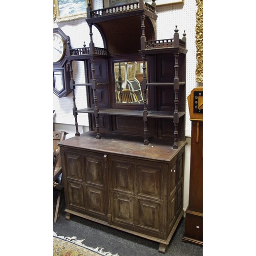 468 - An oak mirror back sideboard, mirrors and shelving to top, two door cupboard to base