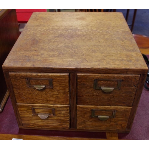 470 - An early 20th century oak four drawer filing cabinet