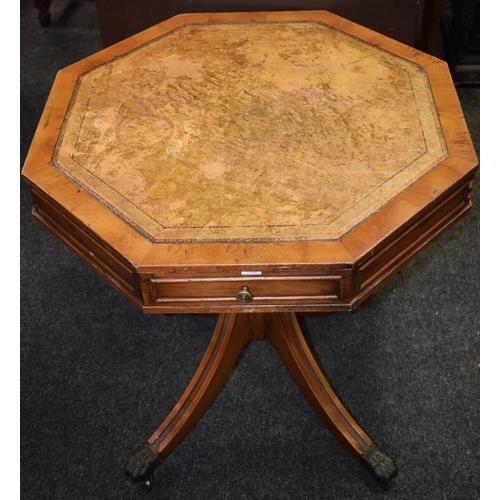 498 - A reproduction octagonal occasional table, tooled leather inlay, drawers to frieze, turned column on... 