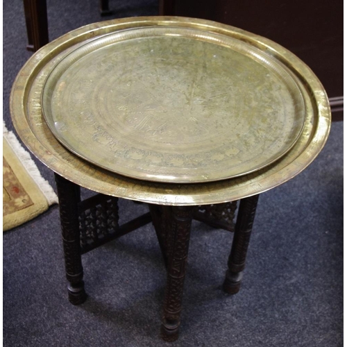 500 - A 19th century brass top occasional table; another tray