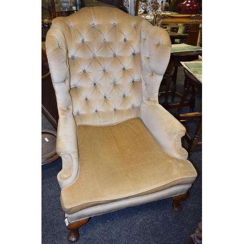 502 - A George III wingback armchair, deep button backed, pale gold upholstery, c.1800, 112 cm x 80 cm x 9... 