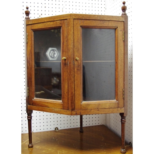 508 - An Edwardian mahogany table top display cabinet, two angled glass panel doors raised on slender tape... 