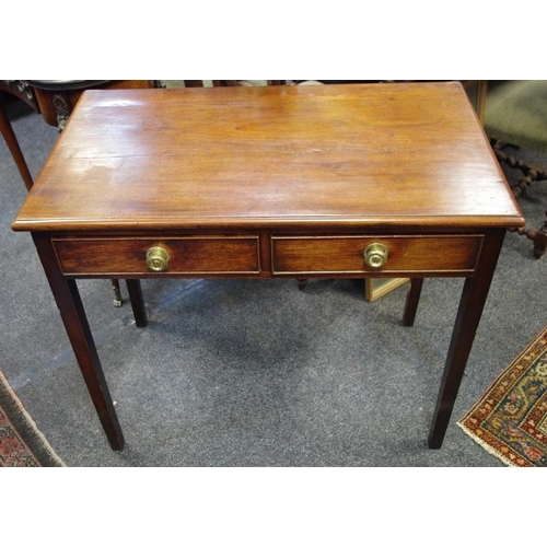 511 - A George III mahogany hall table, two short drawers to frieze, circular brass handles, tapering legs... 