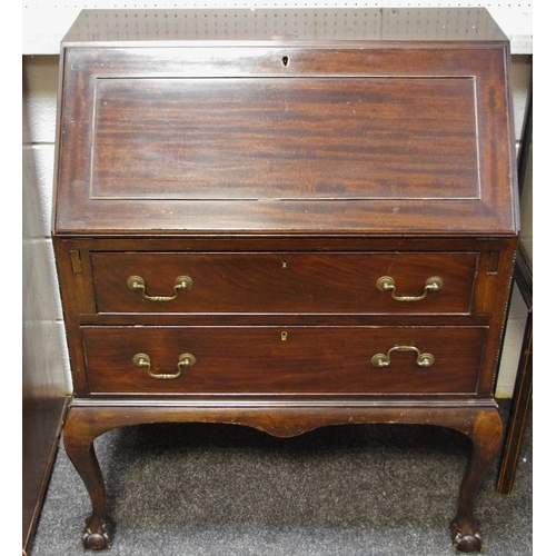 517 - An early 20th century mahogany bureau, ball and claw feet, c.1925