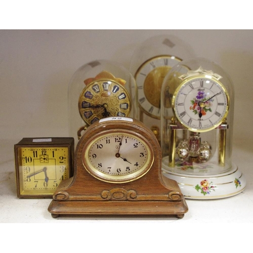 52 - A Continental porcelain anniversary clock; other clocks, various (5)