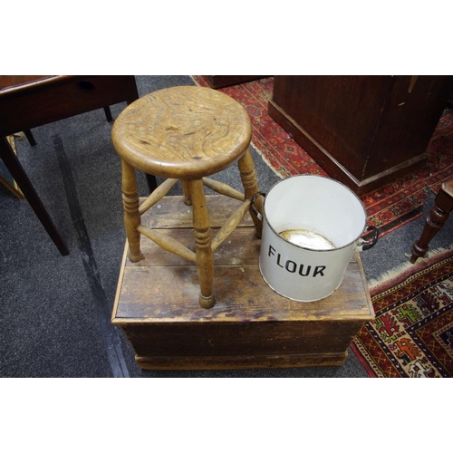 525 - A 19th century pine tool chest; an enamel flour bin and elm milking stool (3)