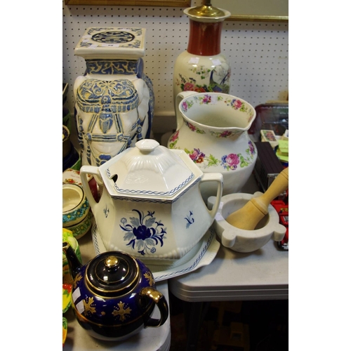 98 - A Staffordshire Adams blue and white soup/stock pot and cover on stand; a ceramic elephant; a mortar... 