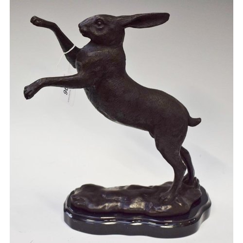 48 - A bronzed metal sculpture, as a boxing hare, 29.5cm high