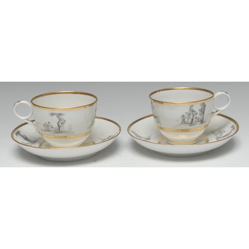 119 - A pair of Barr, Flight & Barr Worcester teacups and saucers, finely bat printed in black with vignet... 