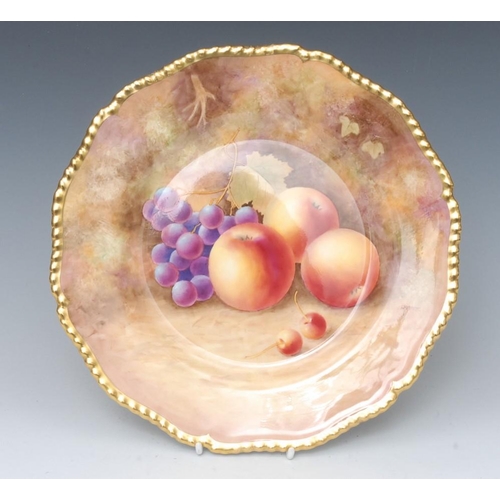 122 - A Royal Worcester shaped circular plate, painted by J. Skerrett, signed, with ripe apples and grapes... 