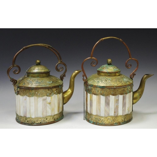 54 - Two Vietnamese brass and abalone tea kettles.