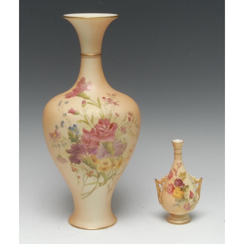 130 - A large Royal Worcester blush ivory baluster vase, painted with carnations and further country flowe... 