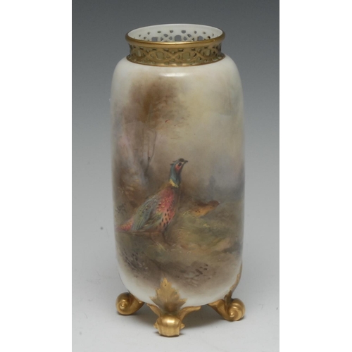 142 - A Royal Worcester vase, painted by Jas Stinton, signed, with pheasants, pierced neck, scroll feet, 1... 