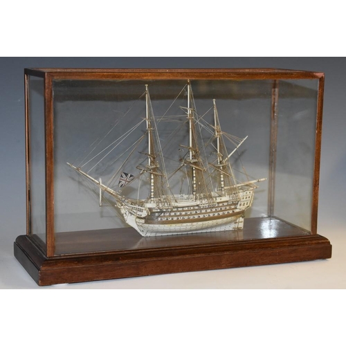 1465 - A Prisoner of War type bone model ship, of a three-masted frigate, displaying the Union Flag, 23cm l... 