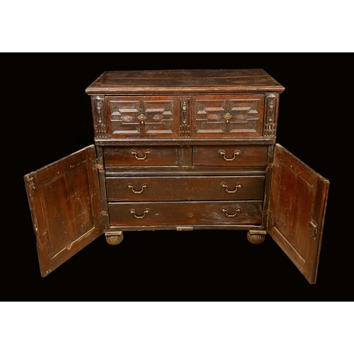 1466 - A '17th century' oak block front half cabinet, rectangular top above a frieze drawer and a pair of r... 