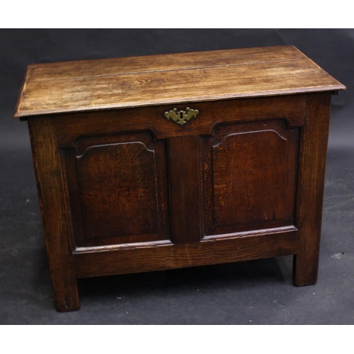 1477 - An '18th century' oak blanket chest, hinged top above a pair of arched raised and fielded panels, st... 