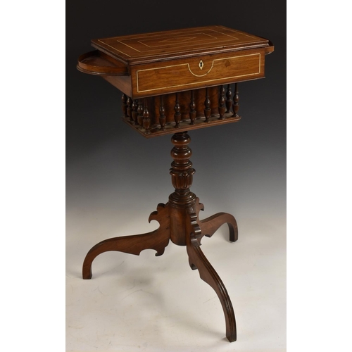 1482 - A 19th century Anglo-Indian hardwood pedestal work table, hinged cover enclosing a lift-out tray and... 