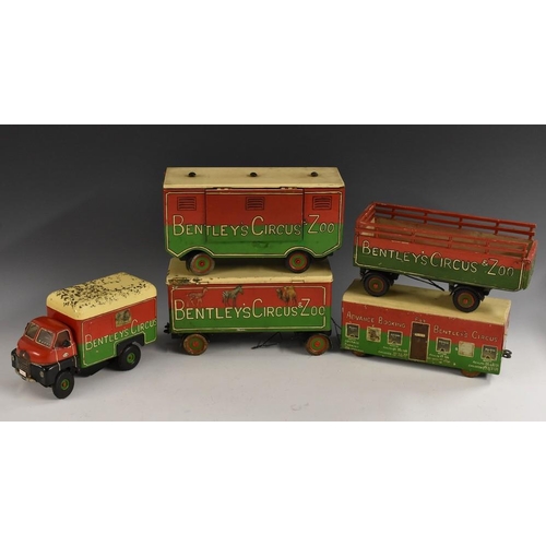 3145 - A Mimic Toys Bentley Circus and Zoo clockwork van, in red and green livery;  four scratch built roll... 