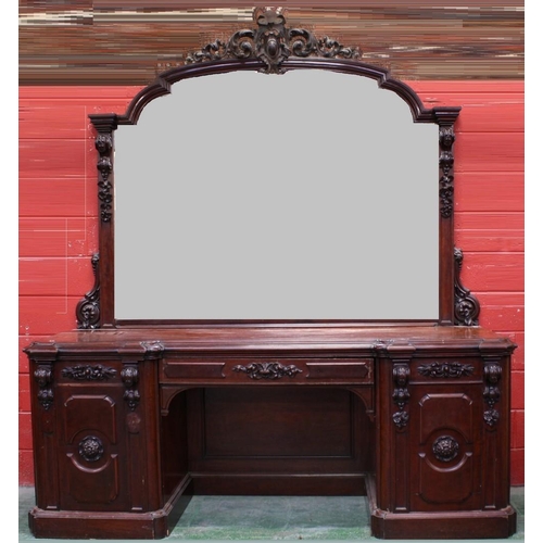 1520 - A substantial Victorian mahogany sideboard, shaped mirror back with foliate cresting, inverted break... 