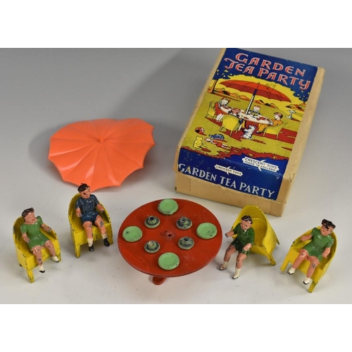 3166 - A Crescent Toys lead figures Garden Tea Party set, red table with parasol, four yellow chairs, four ... 