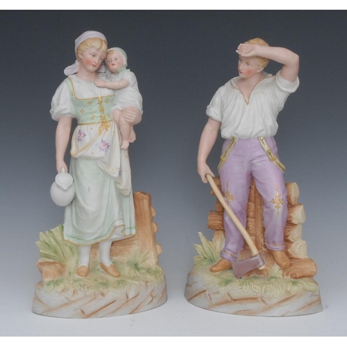 366 - A pair of Gebruder Heubach bisque porcelain figures, of a farmer and wife, he with an axe, she with ... 