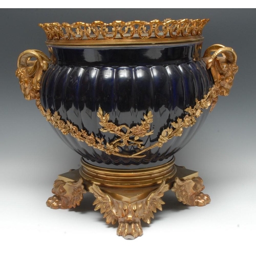 393 - A substantial 19th century French gilt metal mounted fluted ovoid Bleu Royale porcelain jardiniere, ... 