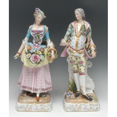 403 - A large pair of Dresden porcelain figures, of a lady and her beau, modelled and decorated in the 18t... 