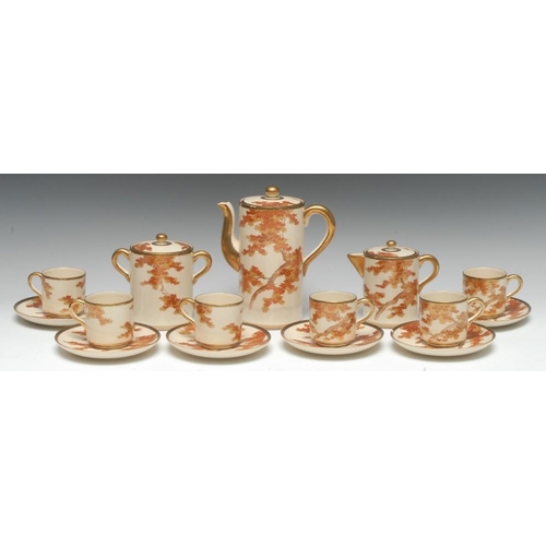 418 - A Japanese Satsuma six-setting coffee set, painted with leafy trees in autumnal tones, gilt and blac... 