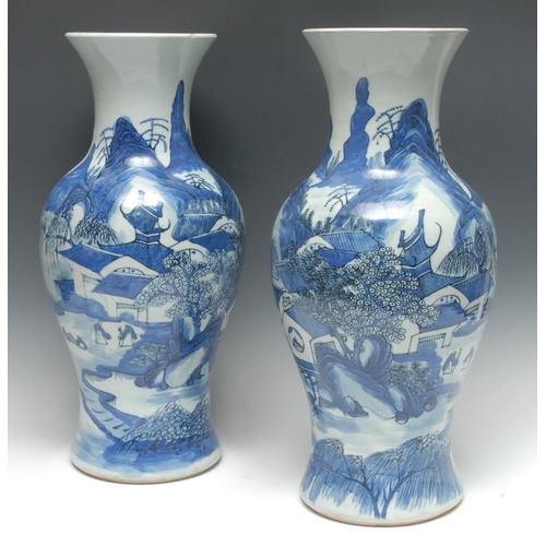 465 - A pair of large Chinese baluster vases, painted in underglaze blue with stylized monumental landscap... 