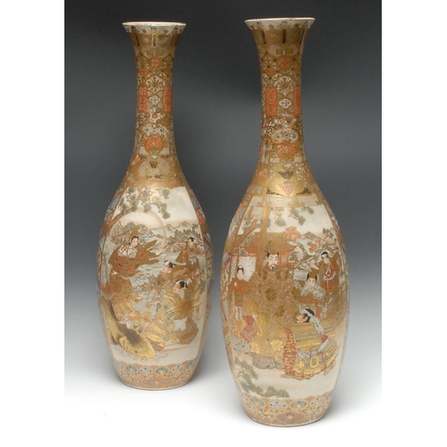 466 - A pair of large Japanese Satsuma slender ovoid vases, densely painted and gilt with samurai, flared ... 