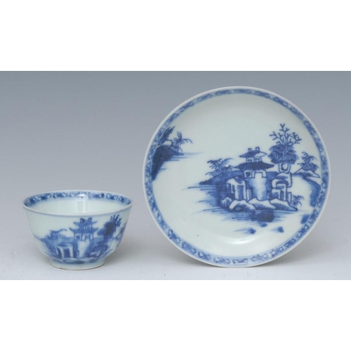 473 - The Nanking Cargo - a Chinese blue and white tea bowl and saucer, decorated in underglaze blue with ... 