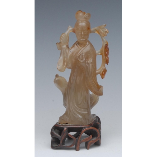 477 - A Chinese agate figure, of a Guan Lin, standing by an oversize duck, pierced stand, 16cm high