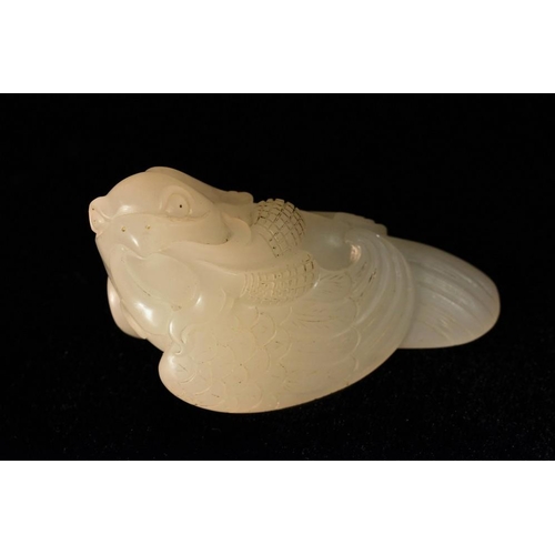 482 - A Chinese pale jade carving, of a bird, 6cm long