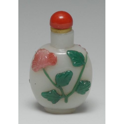 483 - A Chinese Peking glass snuff bottle, overlaid with flowers on a celadon ground, domed stopper, 7cm h... 