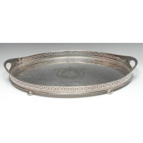 508 - An Adam Revival E.P.N.S oval gallery tray, pierced border, bun feet, 56.5cm wide, c.1900