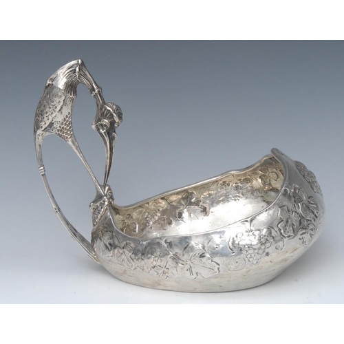 601 - A substantial Russian silver bowl, in the form of a Kovsh, embossed with fruiting vine, stylised pea... 