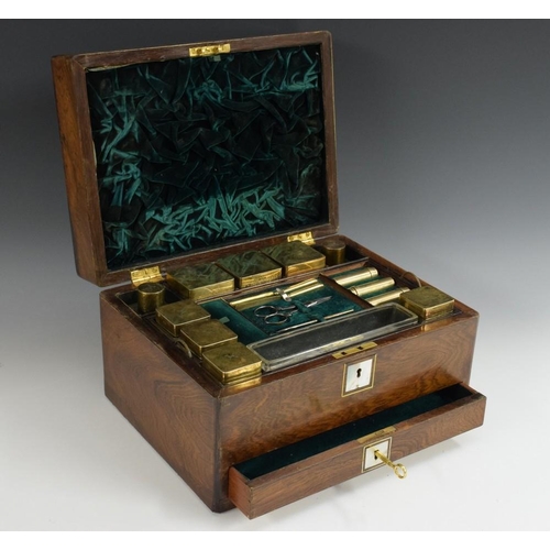 603 - A Victorian rosewood rectangular lady's dressing case, later comprehensively furnished with silver-g... 