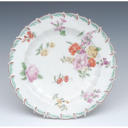 79 - A Chelsea shaped circular plate, painted with summer flowers, feathered rim, in relief, 21cm high, r... 