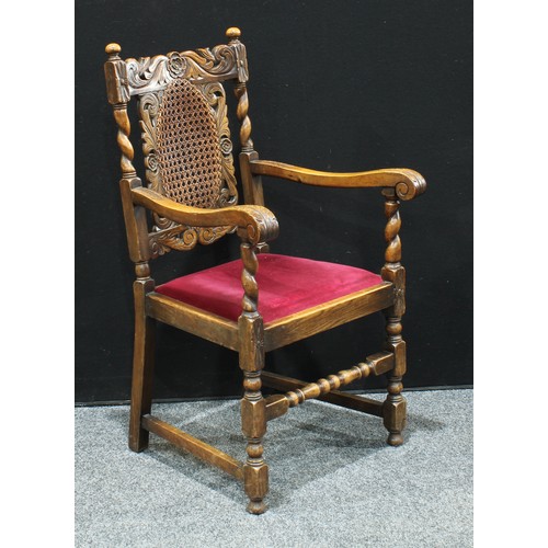 91 - A set of five Jacobean Revival design oak dining chairs, comprising four side chairs and a carver, e... 